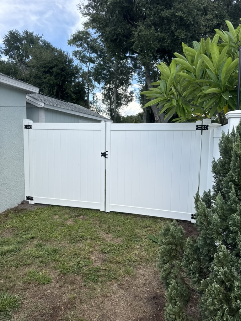 White vinyl double drive gate