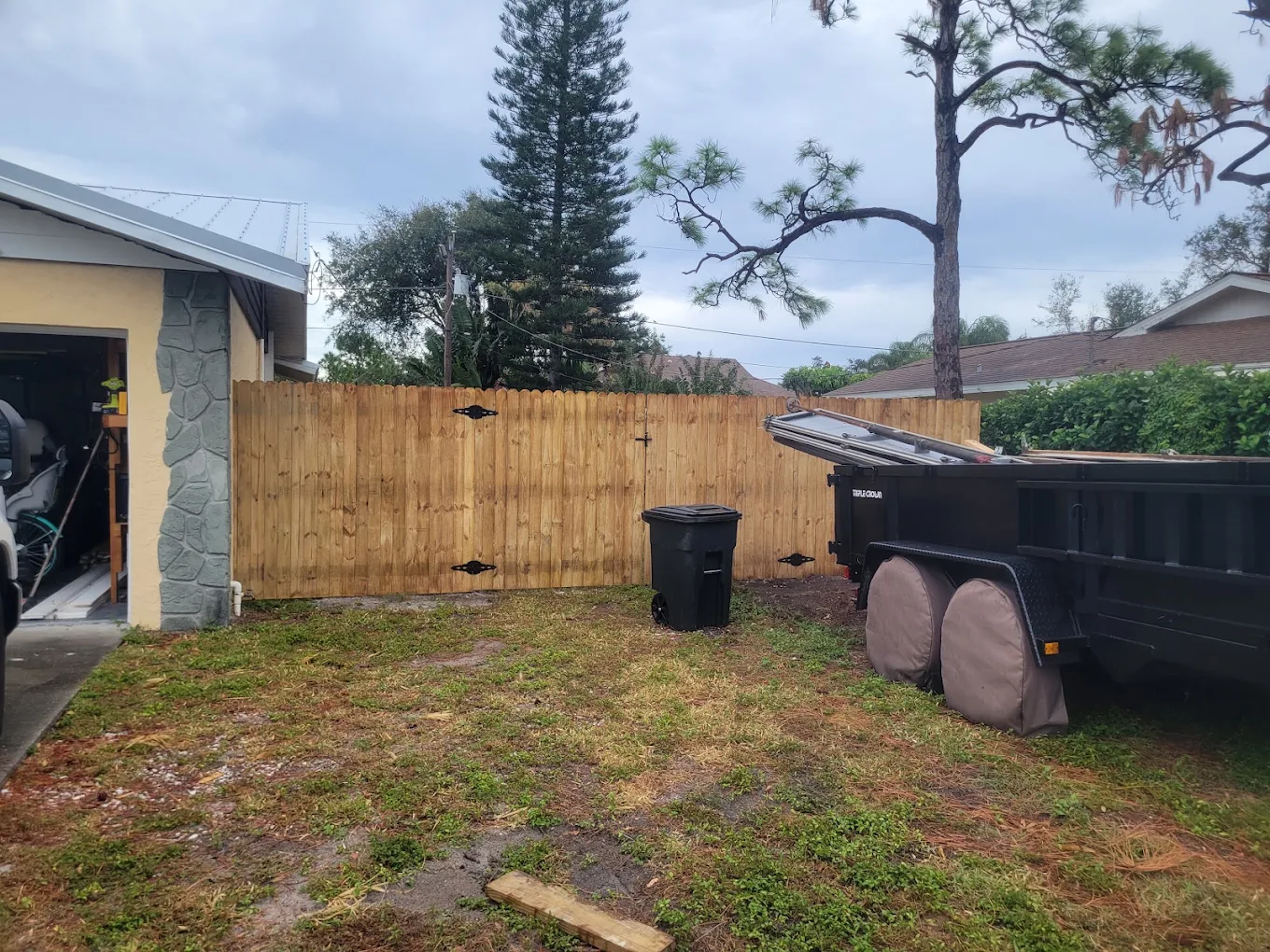 Wide wood privacy gate built for backyard access
